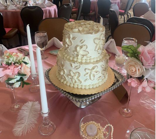 fancy cake used in centerpiece dessert fundraiser