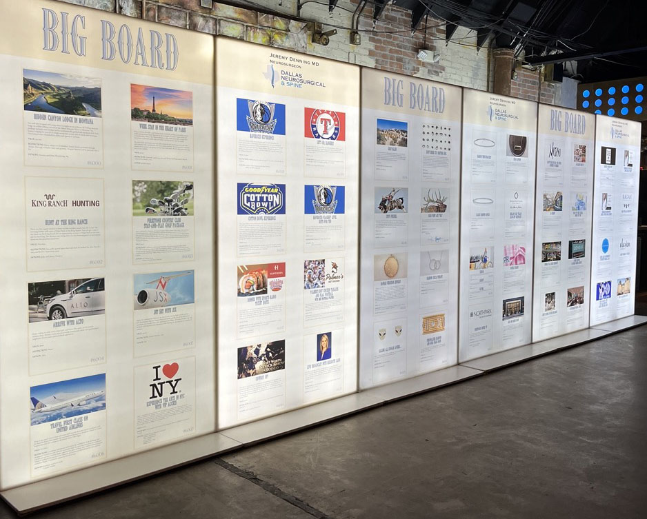 A big board is a visually appealing and effective way to showcase live auction items.