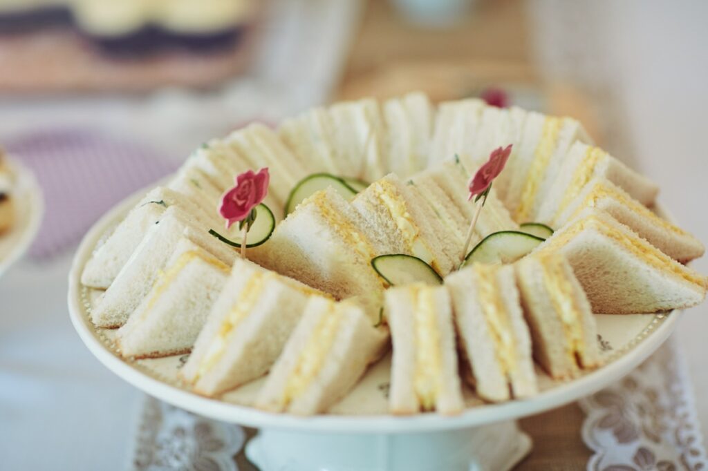 Elegant finger sandwiches are a simple food idea for a day at the races fundraiser theme. 