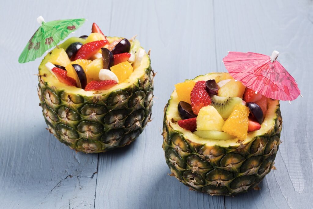 Fruit Salad Served In A Pineapple for Hawaiian Theme Fundraiser