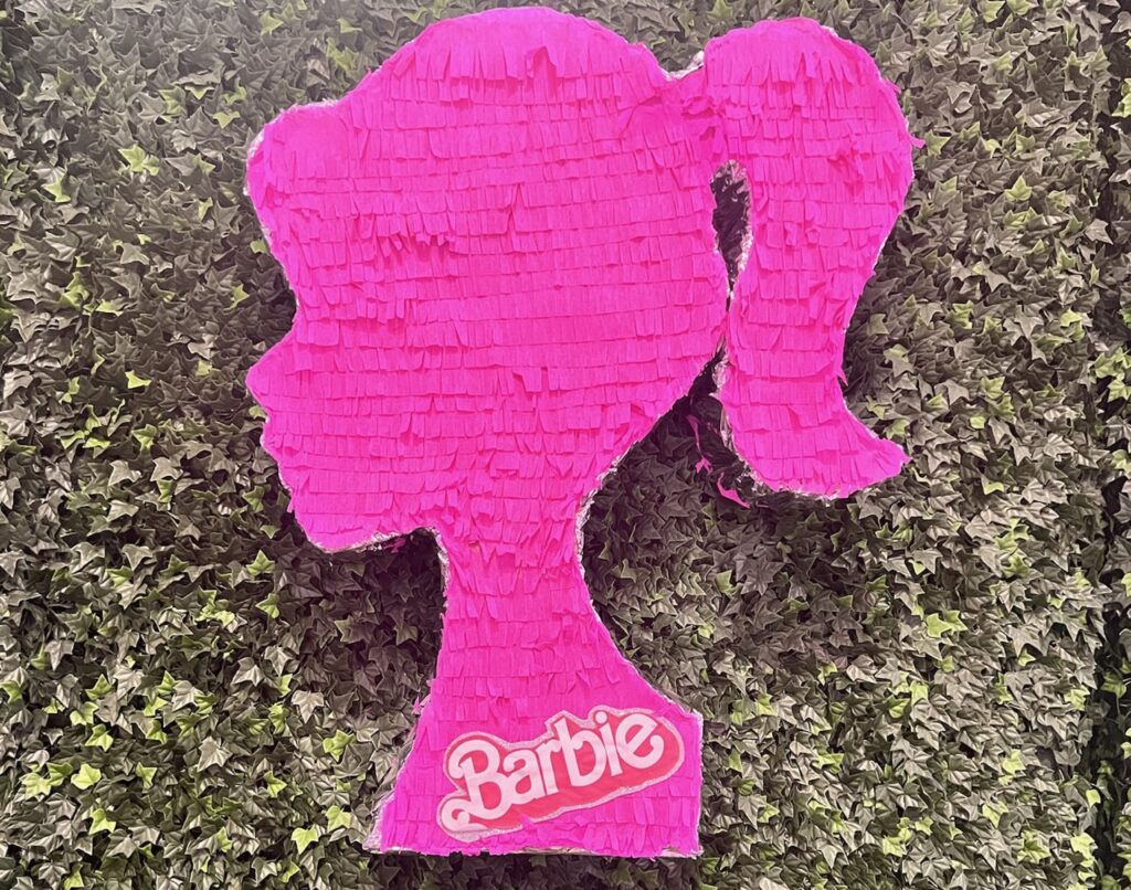 A pink Barbie pinata for a Barbie-Themed Fundraiser event