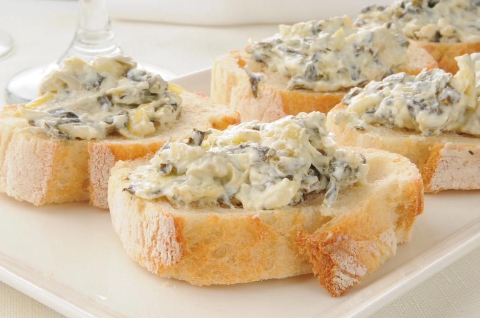 Spinach Artichoke Dip On Italian Toast is a great food idea for a wedding theme fundraising event
