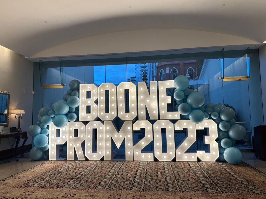 A entrance backdrop makes a great prom themed fundraiser decoration